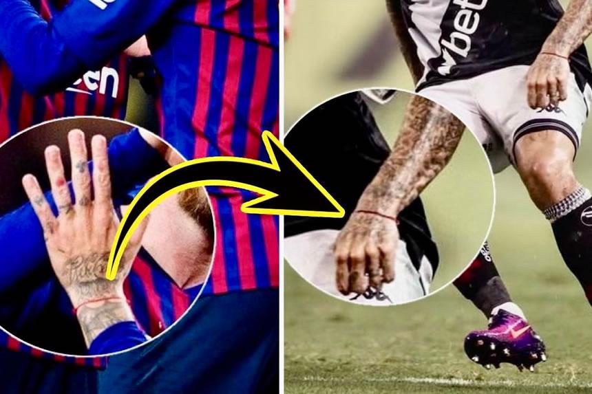 Coutinho na utepe mwekundu wa bahati aliopewa na Messi